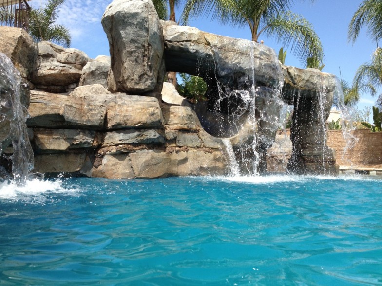Slide through a waterfall, offering an exciting and adventurous outdoor experience for thrill-seekers of all ages.