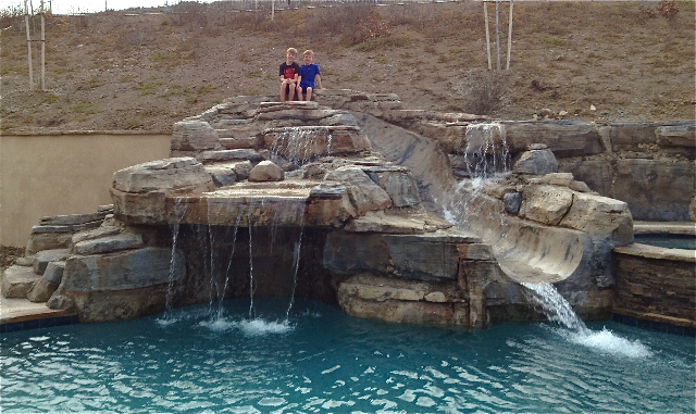 Big slide, offering thrilling outdoor adventure and excitement for all ages.