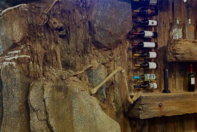 Fossil-themed bar interior with ancient artifacts, providing a unique and memorable ambiance for guests in Westminster California.